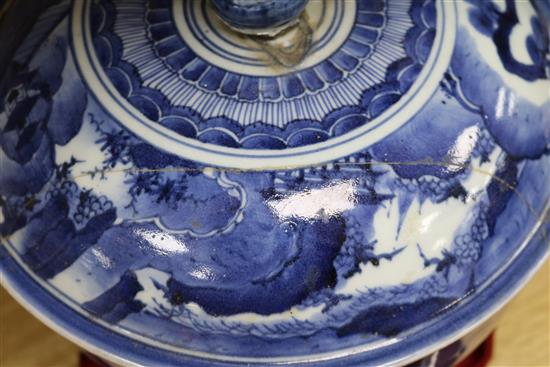 A 19th century Chinese blue and white large bowl and cover, with pomegranate finial (cover repaired)